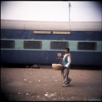 Salesman infront of the train to Varanasi, India